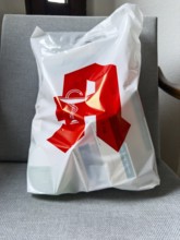 A plastic bag from a pharmacy filled with many medicines in Düsseldorf, Germany