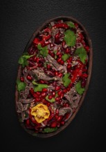 Georgian salad Tbilisi, boiled beef, with red beans and onions, sweet pepper, walnut and