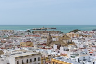 View of the Castillo de San Sebastian, from the Torre Tavira tower over the historic centre of