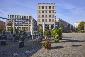 Hotel of the Motel One hotel chain, outdoor area of a restaurant, planters, above-ground district