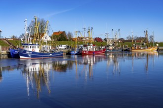 The fishing village of Greetsiel, historic fishing harbour, with the largest shrimp cutter fleet in
