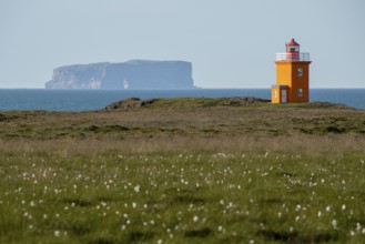 Lighthouse Hegranesviti, Hegranes, peninsula Landsendi, in the background island Drangey, near