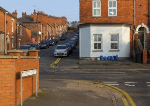 Victorian terraced housing with no front gardens, Bernard Street from Tempest Street, inner city of