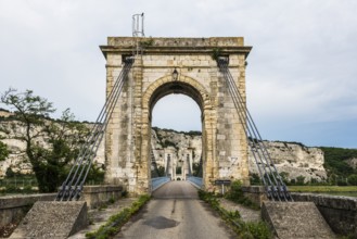 Old suspension bridge over the Rhone and rocks, Passerelle Marc Seguin, Tain-l'Hermitage,