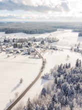 Snowy village with fields and trees, quiet winter atmosphere with sunny sky, Oberreichenbach, Black