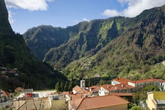Curral das Freiras surrounded by mountains, parish of the district of Câmara de Lobos, tourist