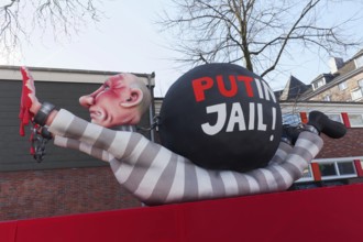 Russian President Vladimir Putin as a convict with blood on his hands, Put In Jail, papier-mâché