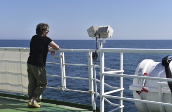 Woman travelling by sea to Heligoland, Schleswig-Holstein, Germany