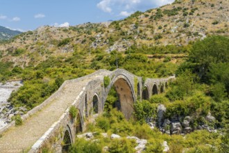 Aerial view of the Old Mes bridge near Shkoder. Albania, Europe. Ottoman stone arch bridge Ura e