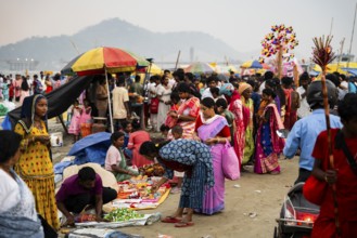 People gather on the bank of Brahmaputra river on Ashoka Ashtami mela during Chaitra Navratri on