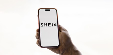 Dhaka, bangladesh- 26 Nov 2024: Shein logo is displayed on smartphone.Shein is a fast fashion