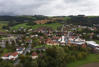 Drone shot, view of village with church, Enzenkirchen, Innviertel, Upper Austria, Austria