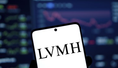 LVMH logo is displayed on smartphone