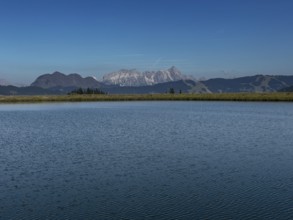 Tyrolean mountains near Saalbach-Hinterglemm, view over the Zwölferkogel reservoir, behind