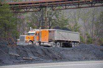 Harlan County, Kentucky - Coal is loaded in trucks along US Highway 119 in the mountains of eastern
