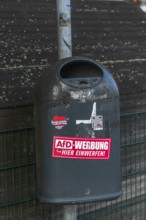 Sticker on a rubbish bin against the AfD, AfD advertising here, parties for the 2025 federal