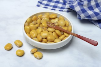 Lupine (Lupinus), pickled lupine seed in small bowls