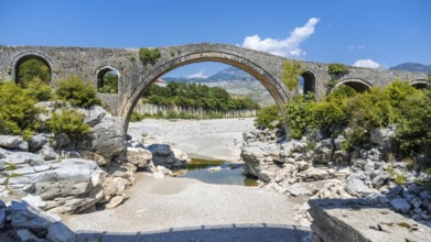 Aerial view of the Old Mes bridge near Shkoder from above. Albania, Europe. Ottoman stone arch