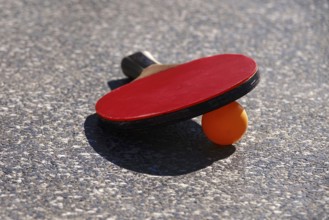 Outdoor table tennis table with ball and bat, Germany