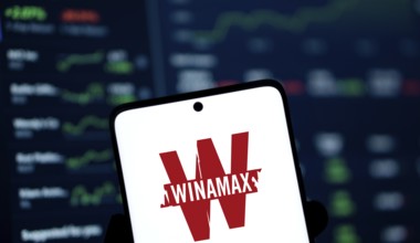 Winamax logo is displayed on smartphone. Winamax is a French gambling company