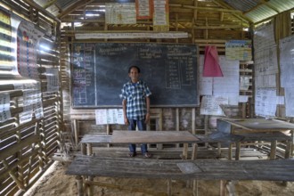 Local teacher in a school in the village of Upovia, Lake Murray, Western Province, Papua New Guinea
