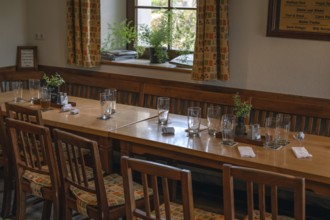 Empty beer glasses and receipts on pub tables, Bavaria, Germany
