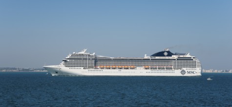 Large cruise ship on open sea with clear sky, MSC cruise ship, MSC Orchestra, Cádiz, Cadiz,