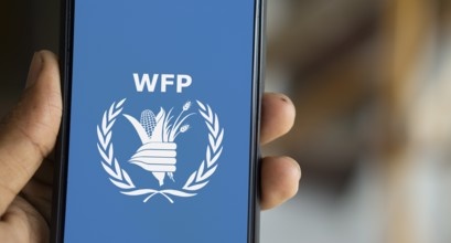 World Food Programme (WFP) logo is displayed on smartphone.