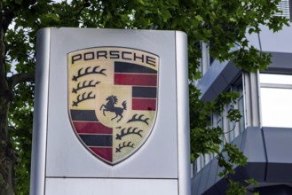 Porsche headquarters at Porscheplatz in Zuffenhausen. Logo of the sports car manufacturer.