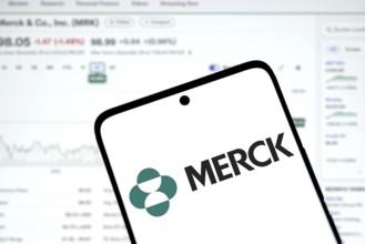 Merck logo is displayed on smartphone. Merck & Co Inc is an American multinational pharmaceutical