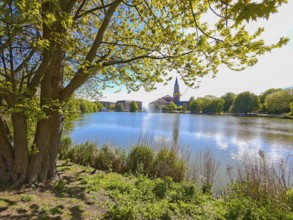 View over the former city moat Kleiner Kiel to the town hall and opera house Damperhof, Hiroshima