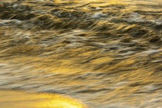 Waves at sunset on the west beach of Fischland-Darß-Zingst, Baltic Sea, Ahrenshoop,