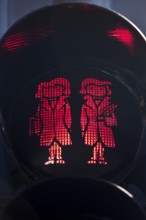 Pedestrian traffic light with red Brothers Grimm Ampelmännchen, Hanau, birthplace of the brothers,
