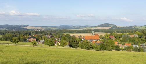 View of the village from the Sängerhöhe with church, school and half-timbered houses, in the