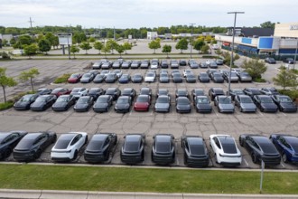 Farmington Hills, Michigan USA - 30 May 2025 - Many dozens of unsold Tesla electric vehicles,