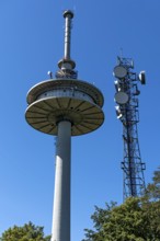 Transmission mast with antennas, telecommunications tower of Deutsche Telekom, transmission tower,
