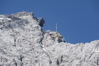 Mountain station of the Bavarian Zugspitze railway, rocky mountain peak of the Zugspitze,