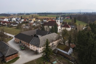 Drone shot, view of village, parish church, Schiedlberg Traunviertel, Upper Austria, Austria