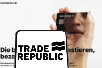 Trade Republic Bank and Neobroker from Germany logo on a mobile phone and website in Stuttgart,