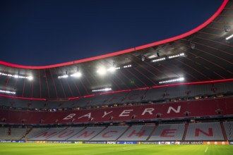 Evening match Allianz Arena, interior, illuminated, lettering FC Bayern Munich, blue hour, UEFA