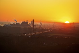 Atmospheric view of the ThyssenKrupp plant with the A 42 motorway at sunrise, Duisburg, North