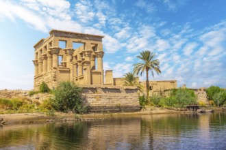 The beautiful temple of Philae and the Greco-Roman buildings seen from the Nile river, a temple