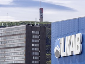 LKAB mining area, large LKAB company sign on building, mining tower in the back, Kiruna, Sweden