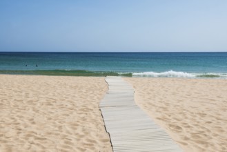Sandy beach beach and blue sea, Spiaggia di Su Portu, Torre di Chia, Chia, south coast, Sardinia,