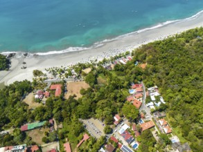 Aerial view, coast and town, Corrohoe Bay and Playa Espadilla, Manuel Antonio National Park,