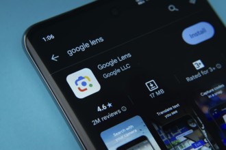 The Google lens app from Google Playstore is displayed on a smartphone screen