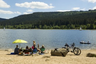 Lake in the mountains and beach in summer, Schluchsee, Black Forest, Baden-Württemberg, Germany