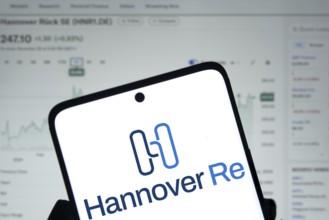 Hannover re logo is displayed on smartphone.Hannover Re is a reinsurance company