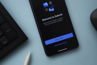 Dhaka, Bangladesh - 17 March 2025: The app of the microsoft outlook is displayed on a smartphone