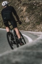 Road bike rider in spring between Lechtal and Tannheimer Tal in front of picturesque scenery of the